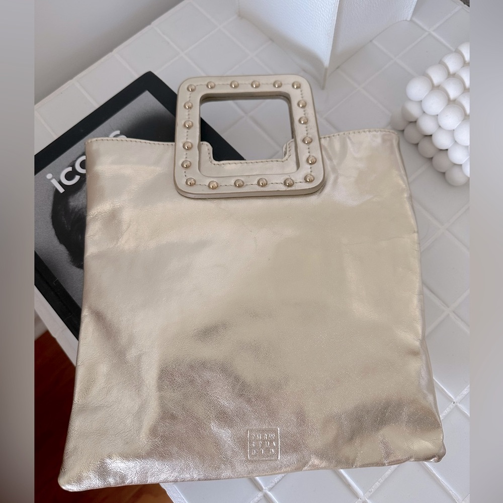Maris Dehart Gold purse with removable straps. 2 inner pockets - never worn.